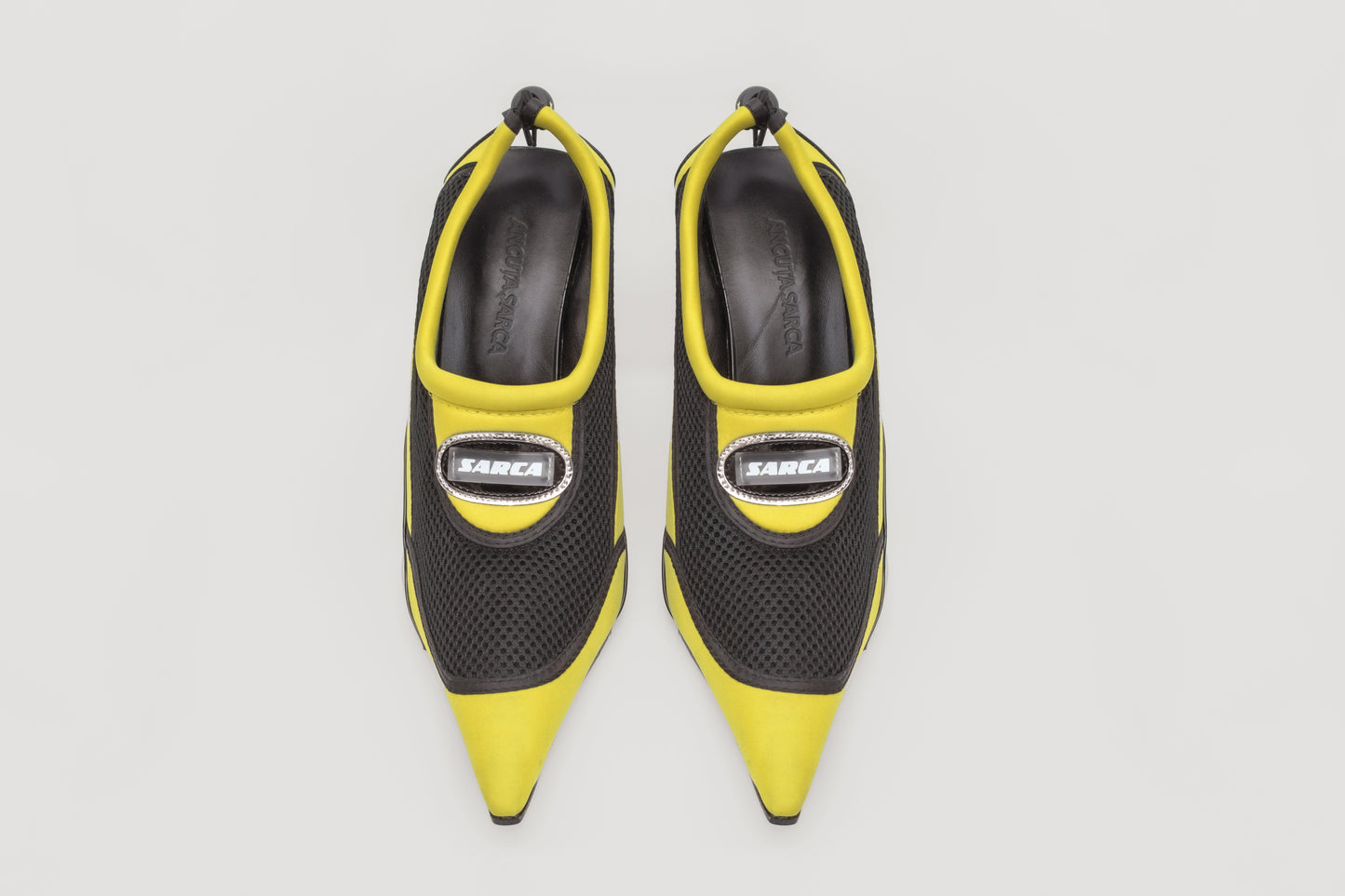 A photograph of the top view of a pair of Ancuta Sarca Aqua Yellow shoe, with 10CM HEEL, SLIP-ON STYLE, PANELLED DESIGN, TOGGLE BACK FASTENING, MADE IN ITALY