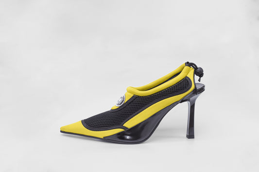 A photograph of the side view of Ancuta Sarca Aqua Heel Black and Yellow shoe, 10CM HEEL, SLIP-ON STYLE, PANELLED DESIGN, TOGGLE BACK FASTENING, MADE IN ITALY