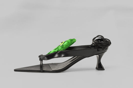 A photograph of side of the view of Ancuta Sarca Tallulah Sandal shoe in BLACK AND GREEN, SELF-TIE ANKLE STRAP FASTENING, PADDED LOGO PATCH ON TONGUE, MADE IN ITALY