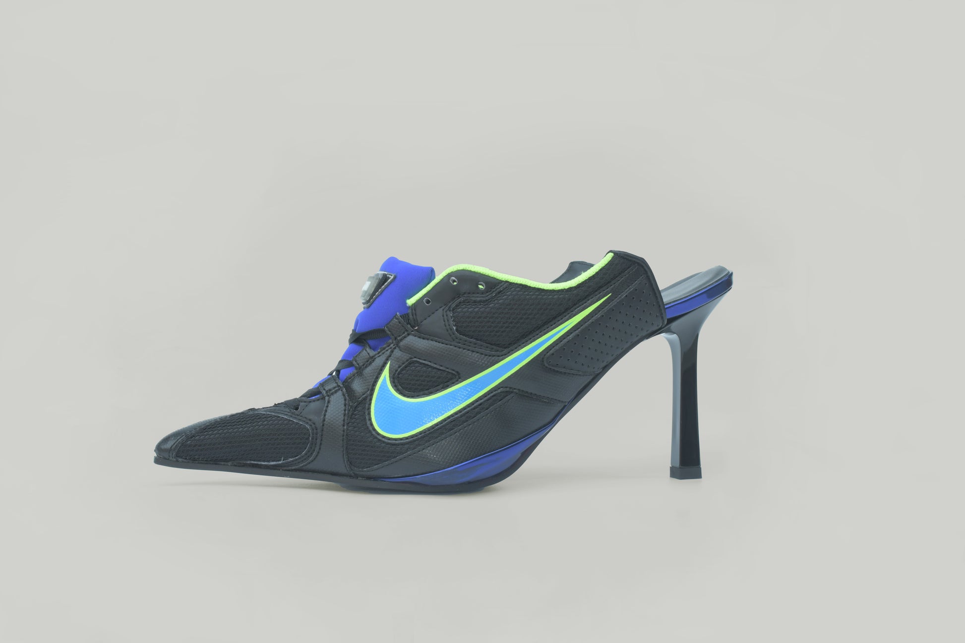 A photograph of the side view of Ancuta Sarca Olympia Heel Black shoe, WITH BLUE AND GREEN DETAILS, FRONT LACE-UP FASTENING, POINTED TOE, SLIP-ON STYLE, MADE IN ITALY
